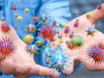 3D-Viren vor geöffneten Händen